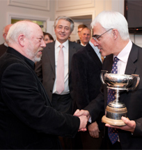 Peter Brookes receives the Political Cartoonist of the Year Award 2011 from Alistair Darling MP. Peter Brookes and Alistair Darling MP.